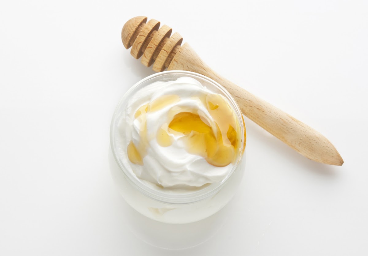 Greek Yogurt With Honey, Top Down View, Isolated On A White Background