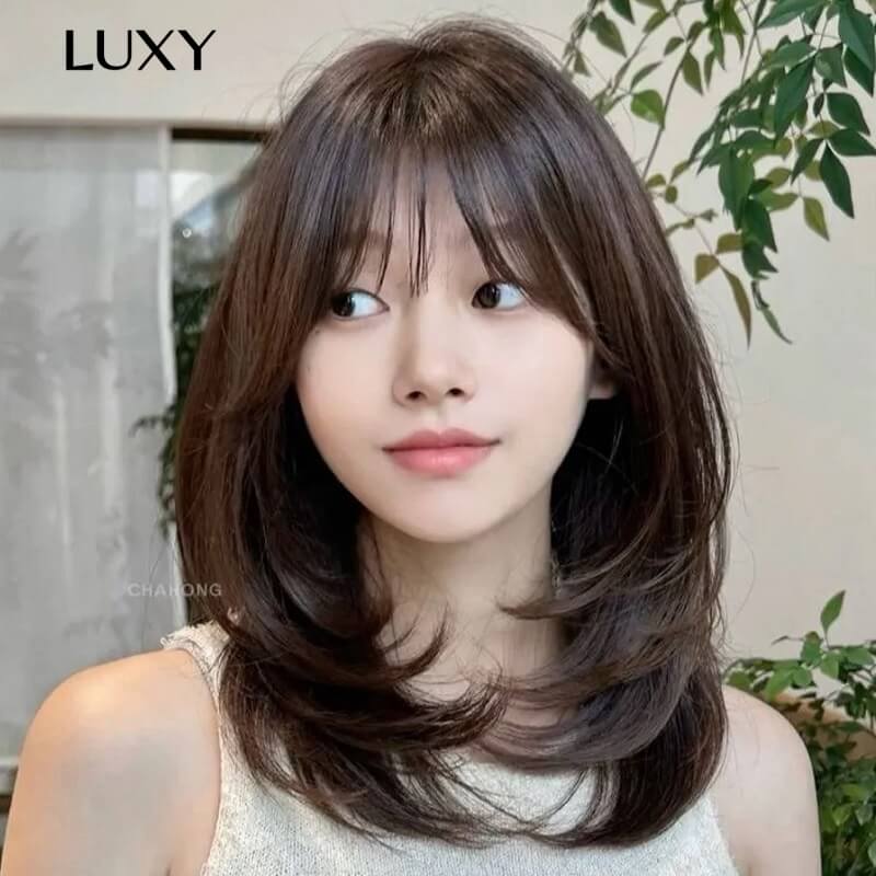 Tóc ngang bầu layer cho khuôn mặt dài và gầy