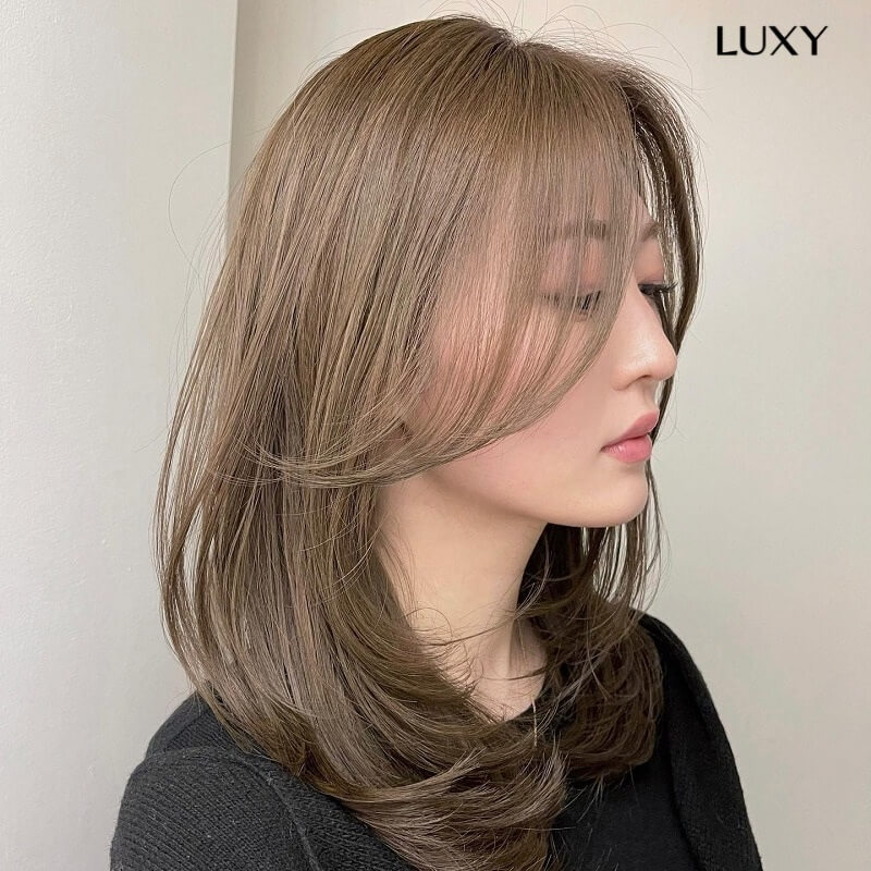 Đặc điểm tóc giả ép cụp ngang vai